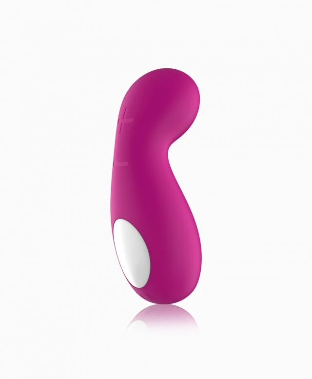 A pink Kiiroo Cliona launch vibrator on a white surface.